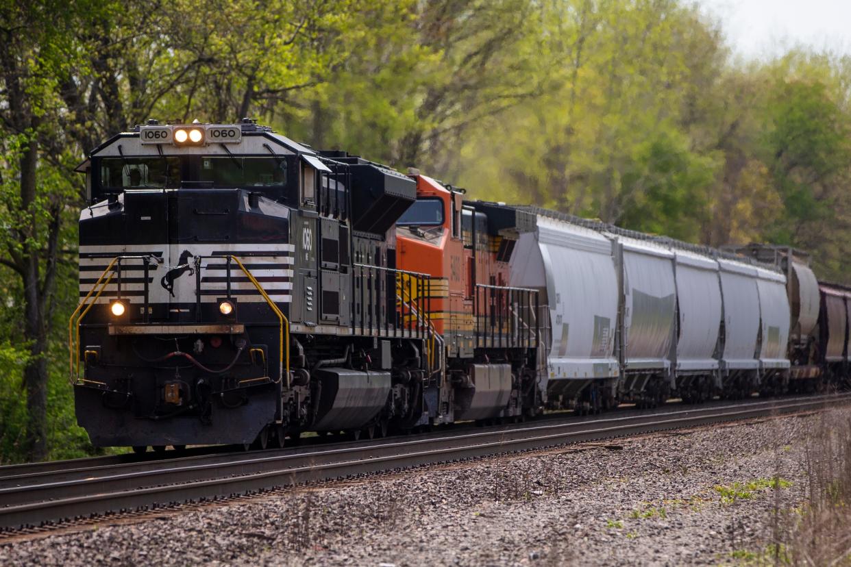A train approaches an intersection Thursday, May 12, 2022 in Osceola. 