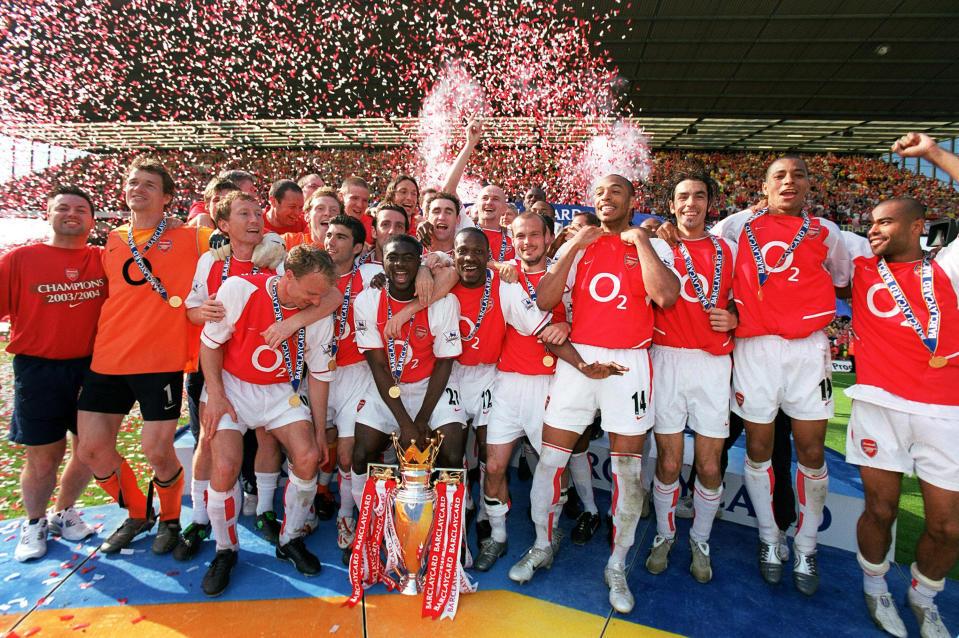 Arsenal Players celebrate beating Leicester City and winning the Premiership season on May 15, 2004 in London, United Kingdom.   (Photo by Stuart MacFarlane/Arsenal FC via Getty Images)