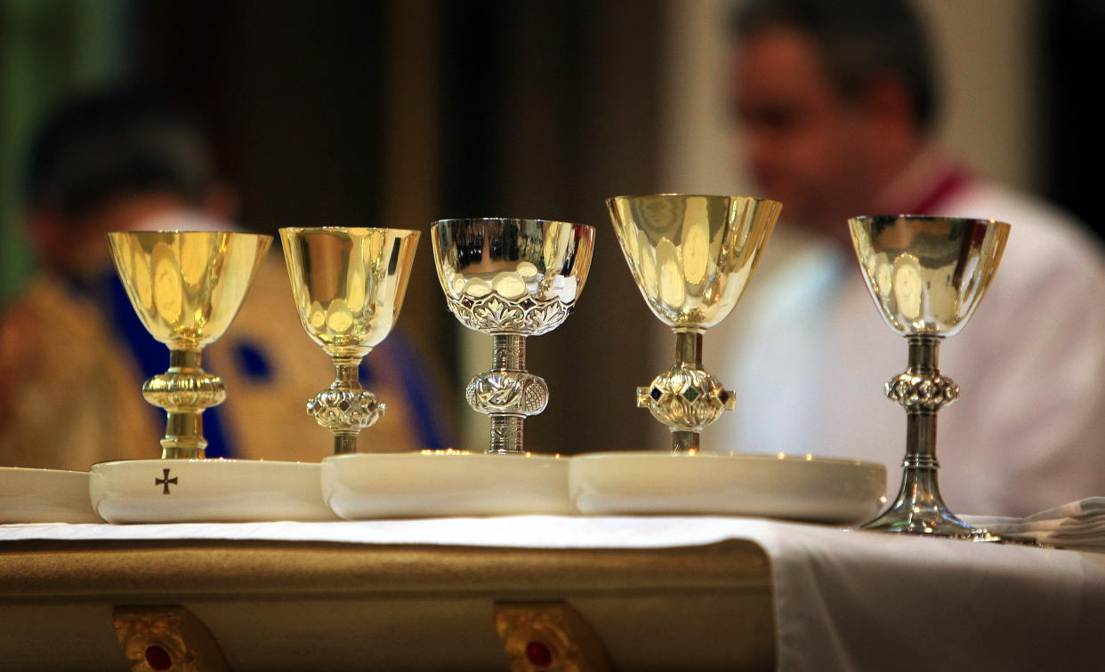 The communion wine and bread is prepared during the Most Reverend Bernard Longley installation of the Most Reverend Bernard Longley as Archbishop of Birmingham at St Chad's Cathedral in the city.   (Photo by David Jones/PA Images via Getty Images)