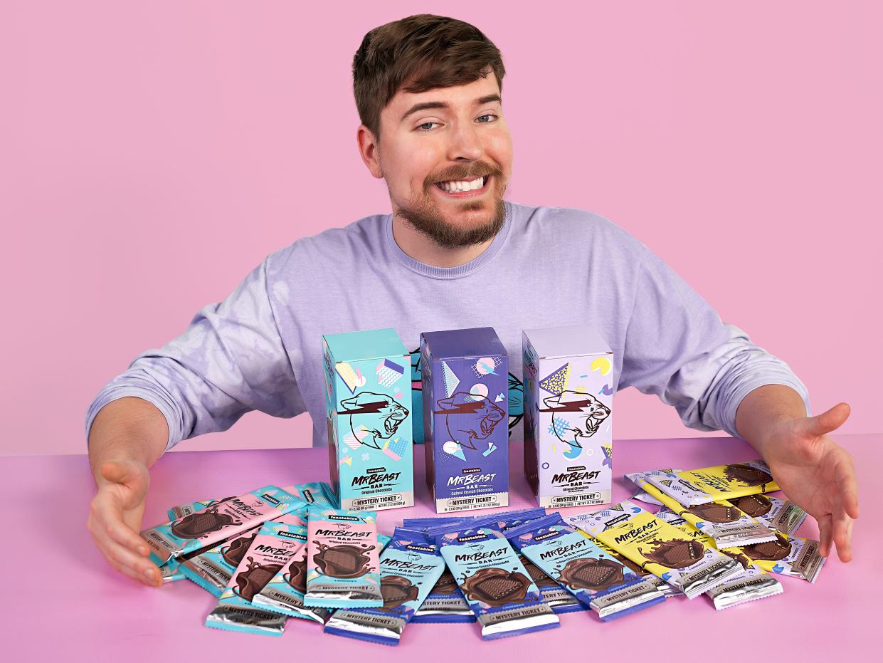 YouTuber MrBeast posing with his Feastables chocolate range.