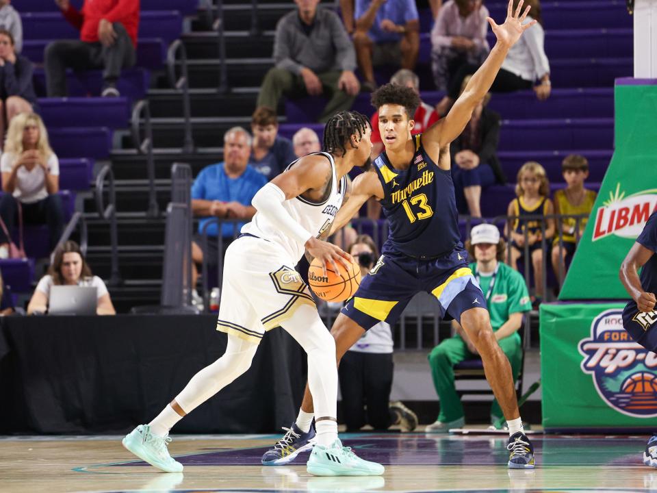 Marquette forward Oso Ighodaro uses his length to guard Georgia Tech's Miles Kelly in the first half Wednesday.