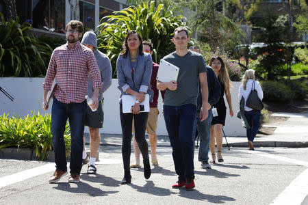 YouTube employees are seen walking away from Youtube headquarters following an active shooter situation in San Bruno, California, U.S., April 3, 2018. REUTERS/Elijah Nouvelage