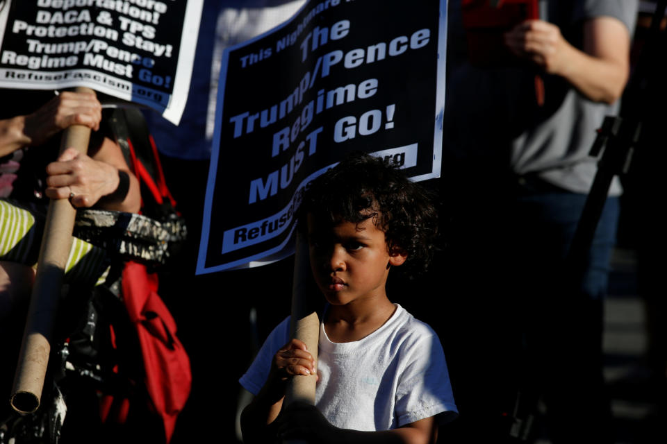 <p>A young protester participates as people protest against the Trump administration’s policy of separating immigrant families suspected of illegal entry, in New York, N.Y. on June 19, 2018. (Photo: Brendan McDermid/Reuters) </p>