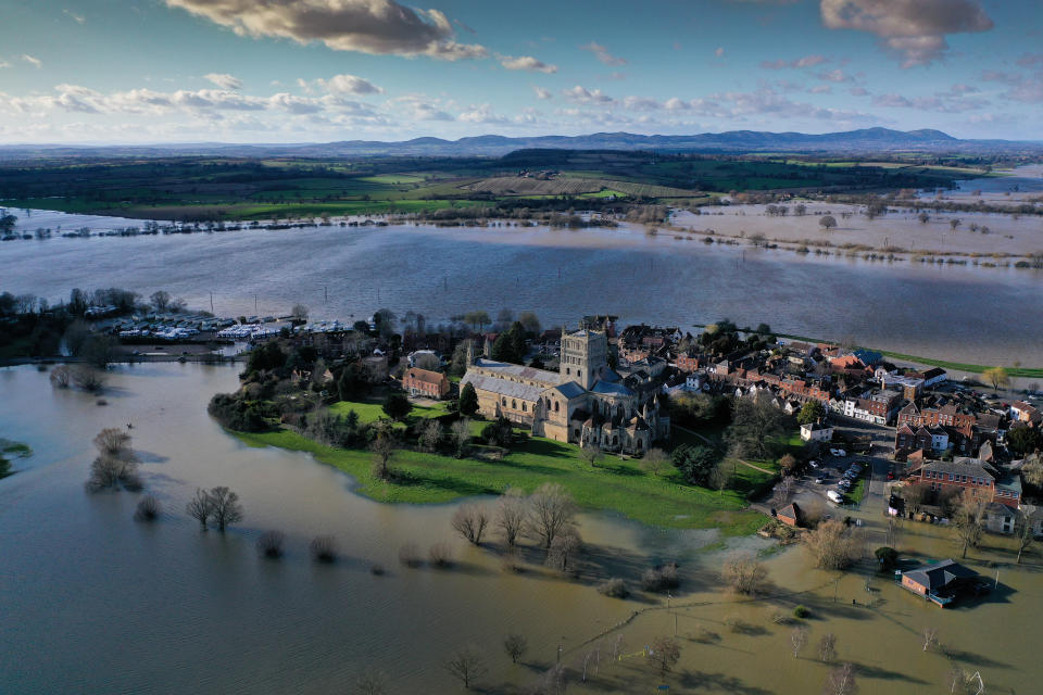 TEWKESBURY, ENGLAND - FEBRUARY 27:  Tewkesbury Abbey, at the confluence of the Rivers Severn and Avon, is surrounded by flood waters on February 27, 2020 in Tewskesbury, England. Flooding levels are decreasing after storms Ciara and Dennis, however forecasters are predicting more rain and 70mph winds this weekend from storm Jorge. (Photo by Christopher Furlong/Getty Images)