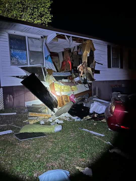 Hole from car crashing through home in Franklin County on April 23. (Photo Courtesy: Franklin County Department of Public Safety)