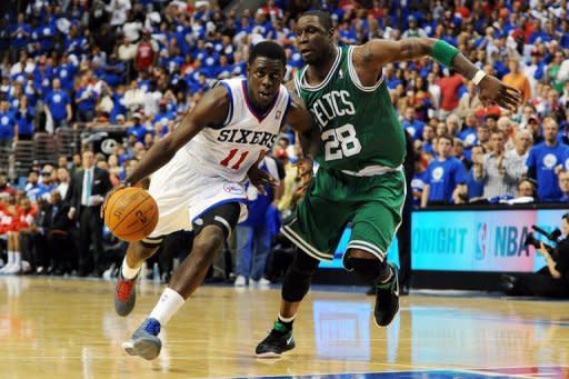 Philadelphia 76ers' Jrue Holiday (L) and Boston Celtics' Mickael Pietrus during game six of their NBA Eastern Conference playoff series on May 23. The 76ers kept their season alive with a 82-75 victory over the Celtics