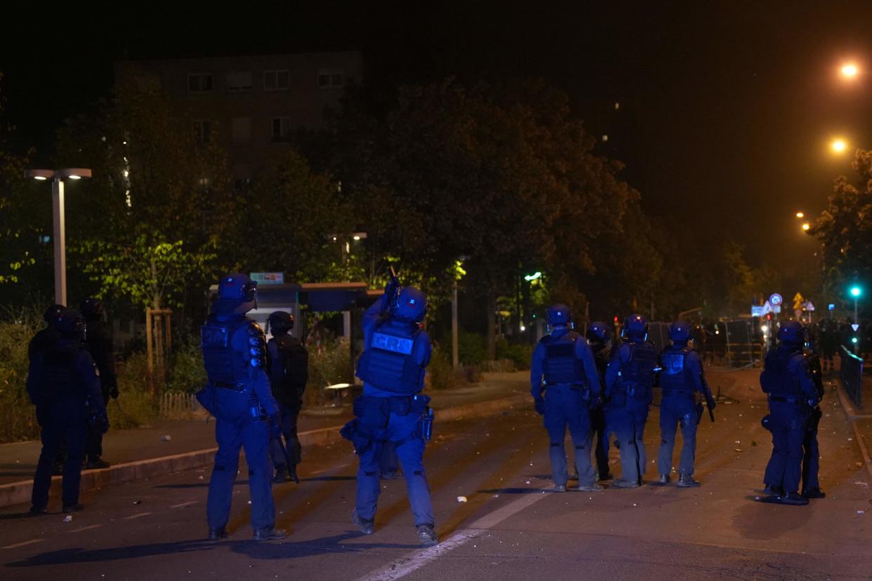 French riot police stand in line during protests in Nanterre, west of Paris, on 28 June 2023 (AFP via Getty Images)