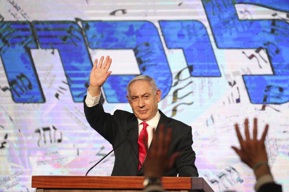 FILE - In this Wednesday, March 24, 2021, file photo, Israeli Prime Minister Benjamin Netanyahu waves to his supporters after the first exit poll results for the Israeli parliamentary elections at his Likud party's headquarters in Jerusalem. Netanyahu missed a midnight deadline for putting together a new coalition government. His failure to reach an agreement late Tuesday, May 4, 2021, raises the possibility that Netanyahu’s Likud party could be pushed into the opposition for the first time in 12 years. (AP Photo/Ariel Schalit, File)