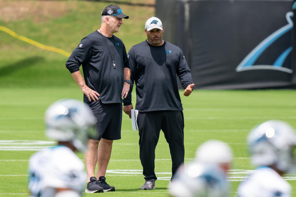 CHARLOTTE, NORTH CAROLINA – MAY 13: (L-R) Head coach Frank Reich and assistant head coach/running backs coach Duce Staley of the <a class="link " href="https://sports.yahoo.com/nfl/teams/carolina/" data-i13n="sec:content-canvas;subsec:anchor_text;elm:context_link" data-ylk="slk:Carolina Panthers;sec:content-canvas;subsec:anchor_text;elm:context_link;itc:0">Carolina Panthers</a> look on during Carolina Panthers Rookie Minicamp at Bank of America Stadium on May 13, 2023 in Charlotte, North Carolina. (Photo by Jacob Kupferman/Getty Images)