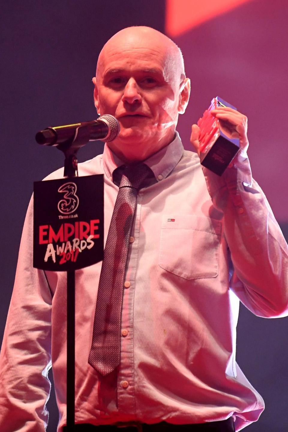 Having a laugh: Dave Johns with his Best Newcomer Award (Getty Images)