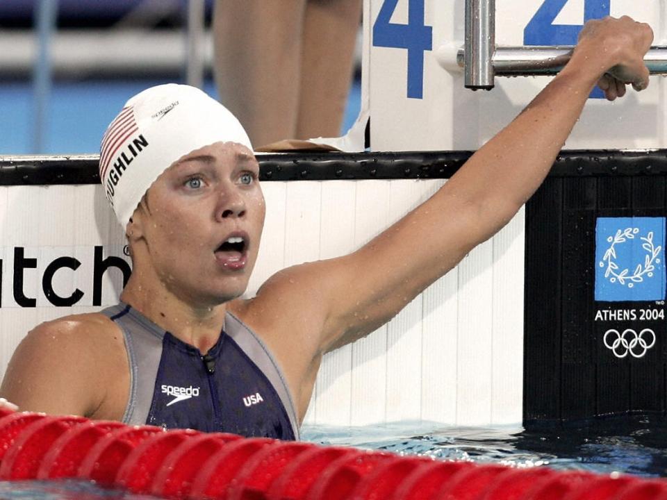 Natalie Coughlin in 2004 in the pool with a shocked face