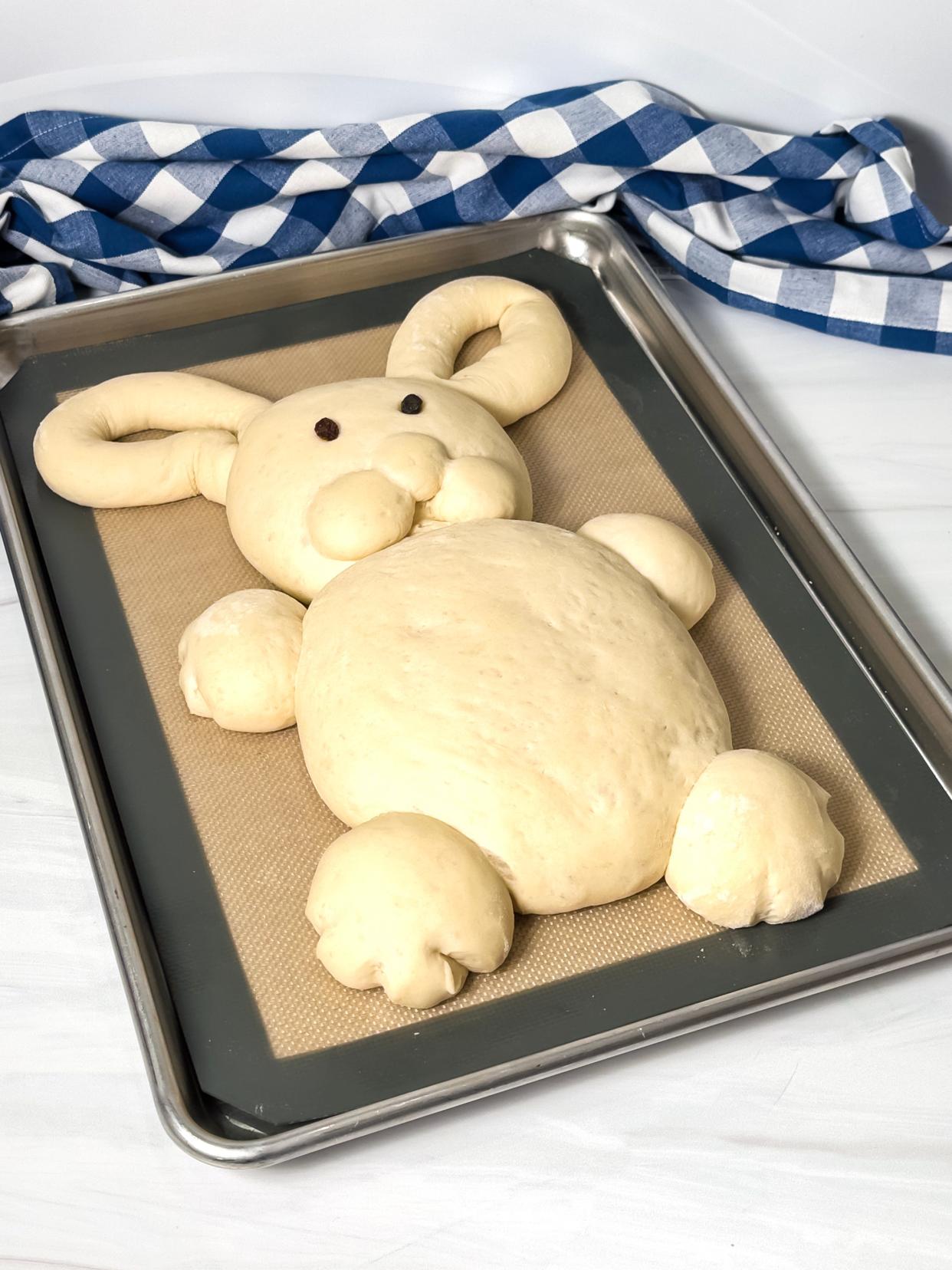 Easter Bunny-shaped French Bread is ready to go into the oven where it bakes for about 25 minutes.