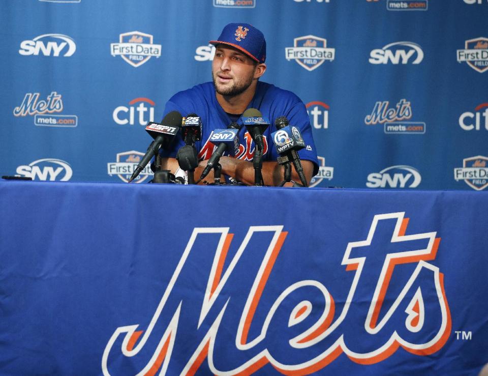 New York Mets outfielder and former NFL quarterback Tim Tebow listens to a reporters question during a news conference at the baseball teams spring training facility in Port St. Lucie, Fla., Monday, Feb. 27, 2017. (AP Photo/John Bazemore)