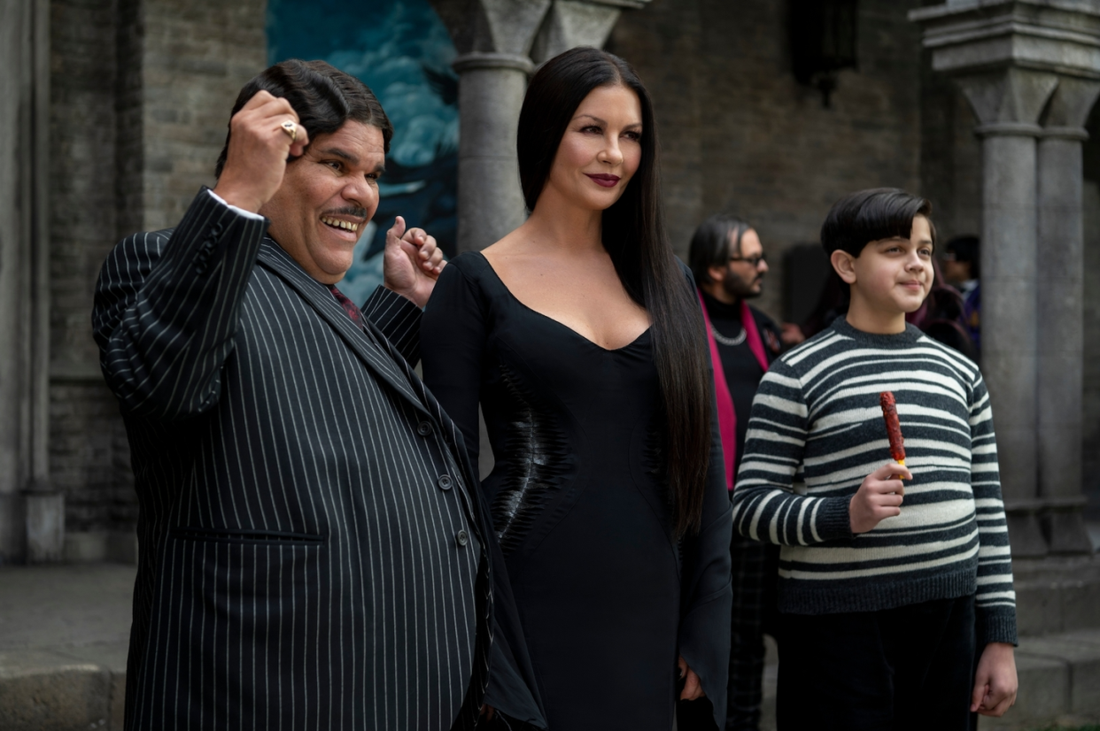 catherine zeta jones as morticia addams and luis guzmán as gomez addams, plus isaac ordonez as pugsley addams