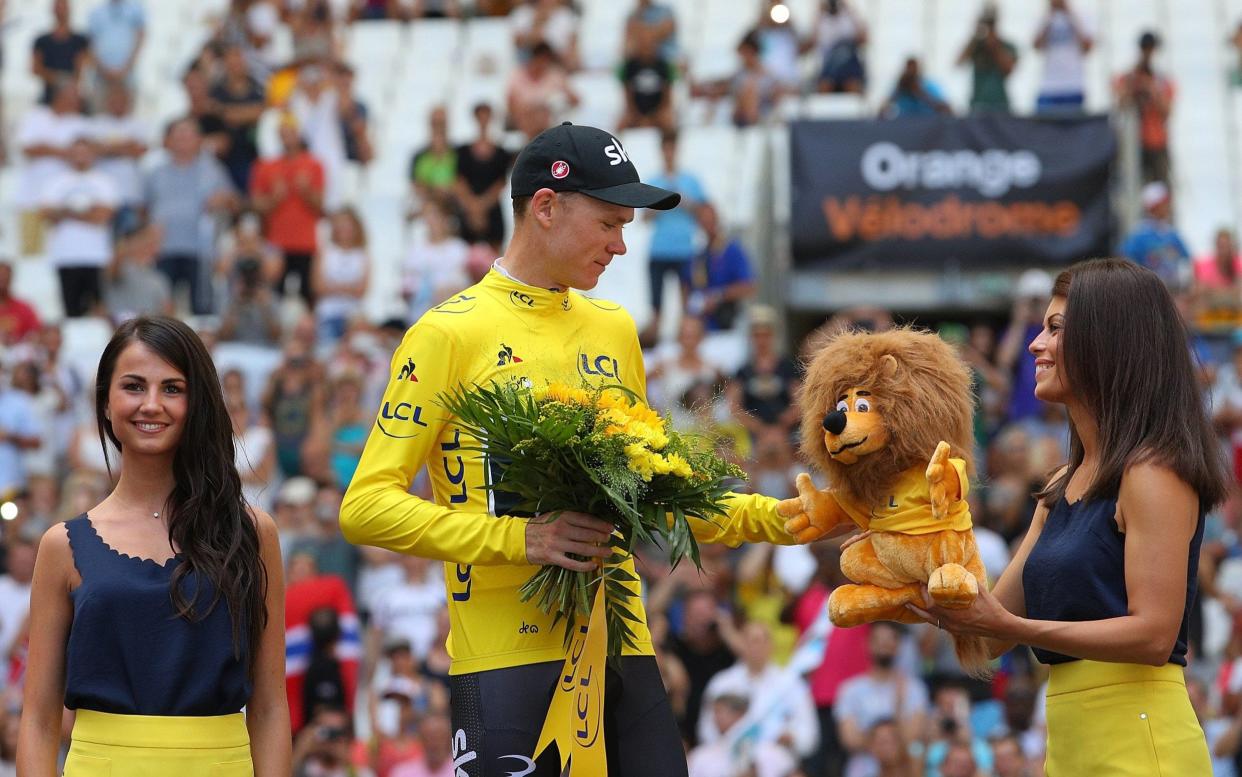 Chris Froome on the podium - Getty Images Europe