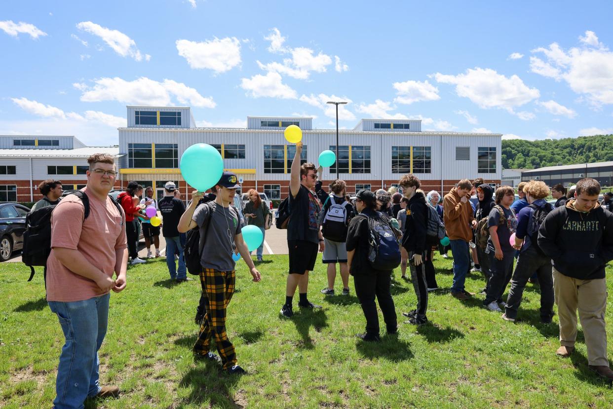 On May 8, students at Midland Innovation and Technology Charter School organized a walk out during their lunch break. Amid their protest, they carried blue and yellow balloons.