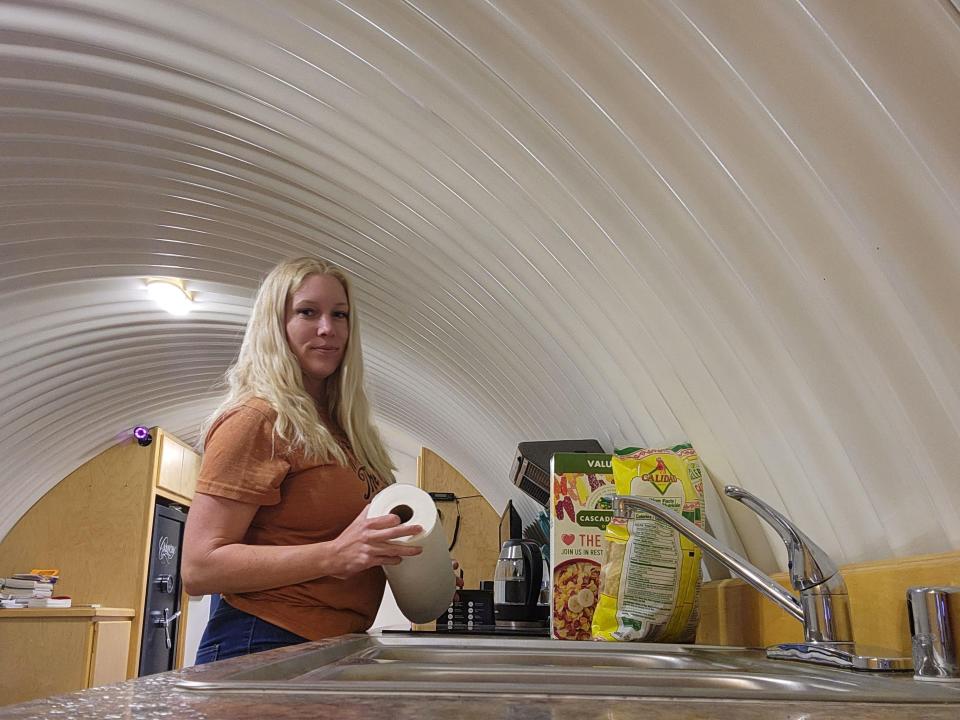 Caitlin in the kitchen of the bunker.