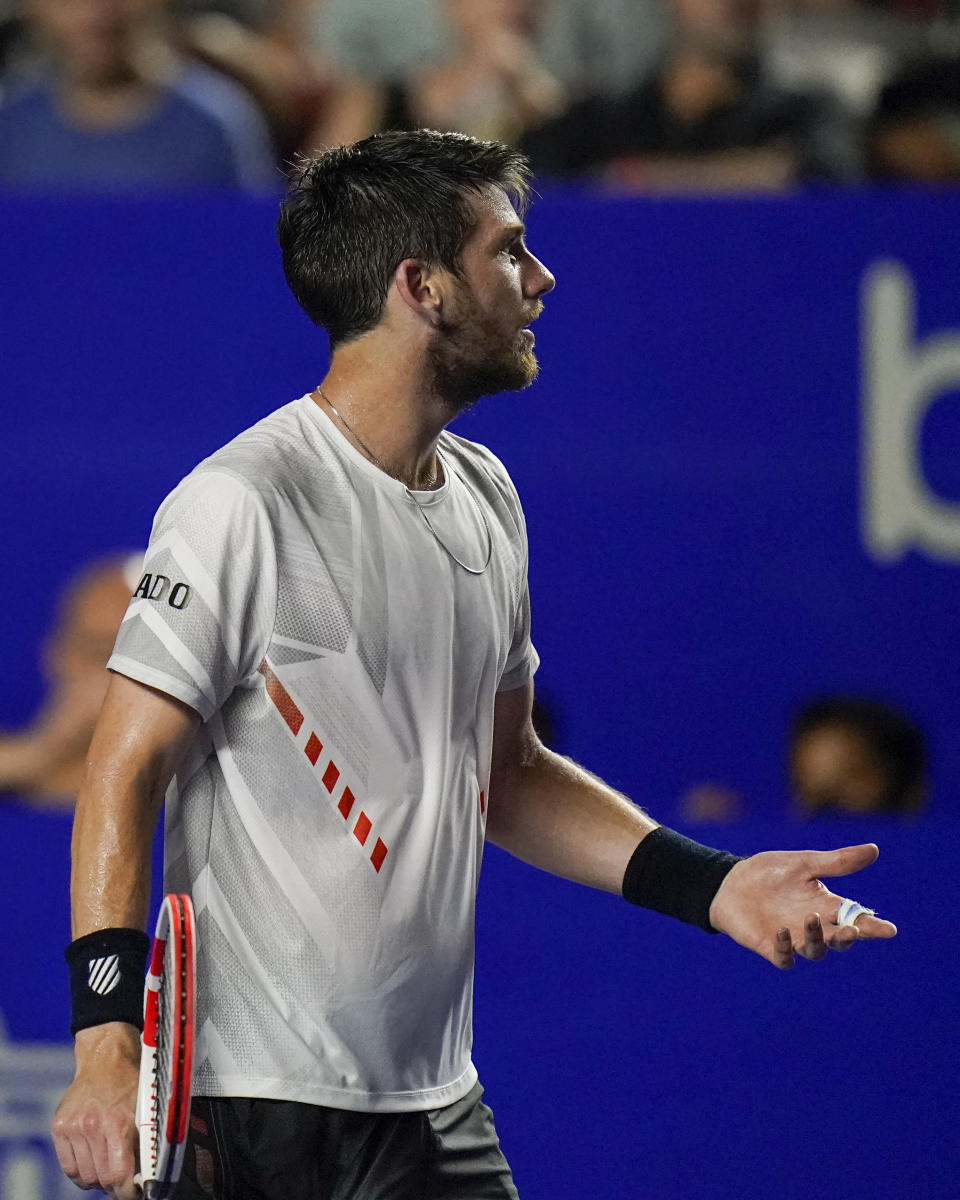 Britain's Cameron Norrie reacts as he plays Spain's Rafael Nadal in the final match at the Mexican Open tennis tournament in Acapulco, Mexico, Saturday, Feb. 26, 2022. (AP Photo/Eduardo Verdugo)