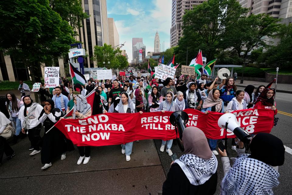 On the 76th anniversary of the Nakba, the displacement of Palestinian refugees from their homes in Israel, pro-Palestinian protesters march through Downtown, shutting down traffic along High Street.