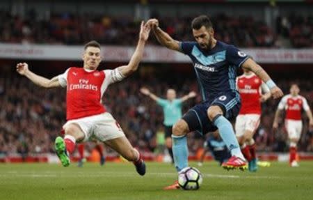 Britain Soccer Football - Arsenal v Middlesbrough - Premier League - Emirates Stadium - 22/10/16 Middlesbrough's Alvaro Negredo in action with Arsenal's Laurent Koscielny Action Images via Reuters / John Sibley Livepic