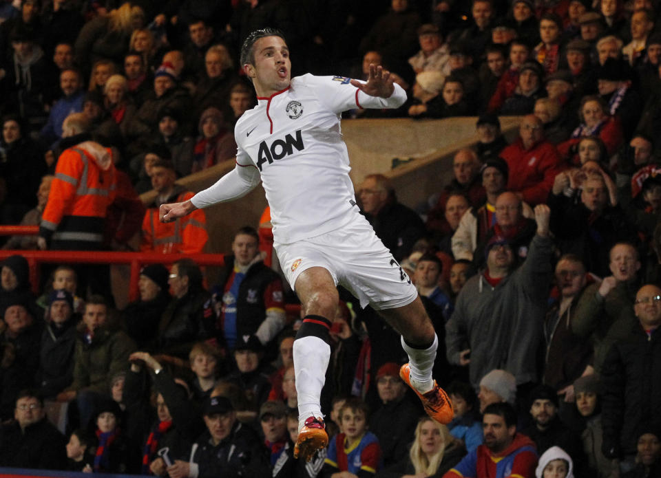 Manchester United's Robin Van Persie celebrates his penalty goal against Crystal Palace during their English Premier League soccer match at Selhurst Park, London, Saturday, Feb. 22, 2014. (AP Photo/Sang Tan)