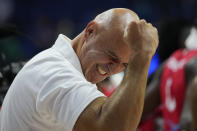 Angola coach Jose Claros Canals celebrate after their win against the Philippines during their Basketball World Cup group A match at the Araneta Coliseum in Manila, Philippines Sunday, Aug. 27, 2023. (AP Photo/Aaron Favila)