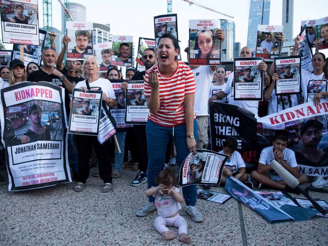 Relatives of hostages that were kidnaped to the Gaza Strip call for the Israeli government to bring them back in Tel Aviv, Israel (Getty Images)