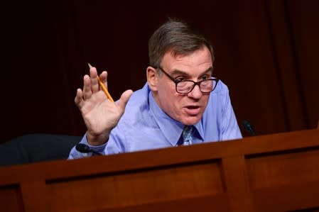 Warner speaks during Facebook digital currency hearing