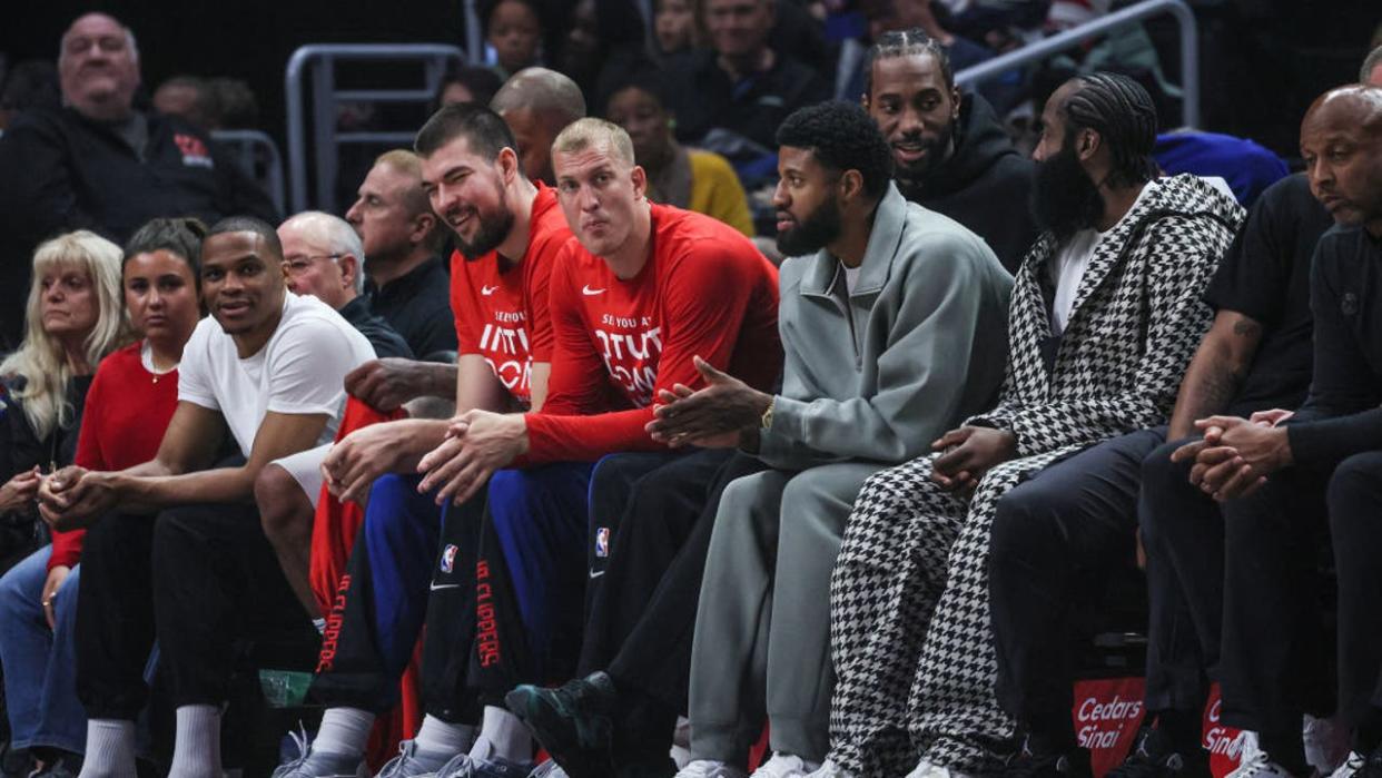 <div>Clippers starters including Paul George, James Harden and Kawhi Leonard sit on the bench in street clothes during a game against the Houston Rockets at Crypto.Com Arena. (Robert Gauthier/Los Angeles Times via Getty Images)</div> <strong>(Getty Images)</strong>