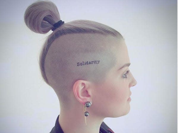 Kelly Osbourne head tattoo