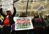 ST LOUIS PARK, MN - MARCH 01: Protestors on stage during a rally for Democratic presidential candidate Sen. Amy Klobuchar (D-MN) on March 1, 2020 in St Louis Park, Minnesota. The protesters, critical of Klobuchar's history as a prosecutor in Hennepin County, successfully shut down the event. (Photo by Stephen Maturen/Getty Images)