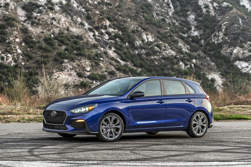 This photo provided by Hyundai shows the 2020 Hyundai Elantra GT, a small hatchback that offers ample interior space and an optional turbo engine with more power. It will be discontinued after the 2020 model year. With the rampant popularity of SUVs, small, cheap cars are riding off into the sunset. If you need an efficient and low-priced vehicle, we suggest getting one of these sub-$25,000 models now before they’re gone for good.(Hyundai Motor America via AP)
