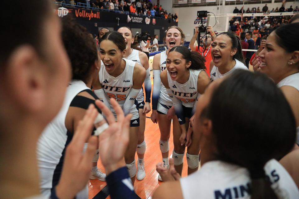 The Miners volleyball team is jubilant as players celebrate a sweep over University of South Florida at Memorial Gym on Sunday, Dec. 10. UTEP will advance to the National Invitational Volleyball Championship final.