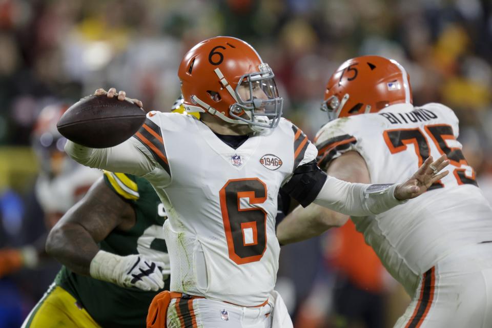 Cleveland Browns' Baker Mayfield throws during the first half of an NFL football game against the Green Bay Packers Saturday, Dec. 25, 2021, in Green Bay, Wis. (AP Photo/Matt Ludtke)