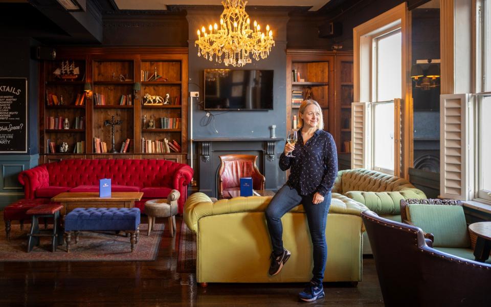 Siobhan Grogan strikes a classic Taylor Swift pose at The Bull & Gate pub, where scenes from Swift's End Game video were filmed