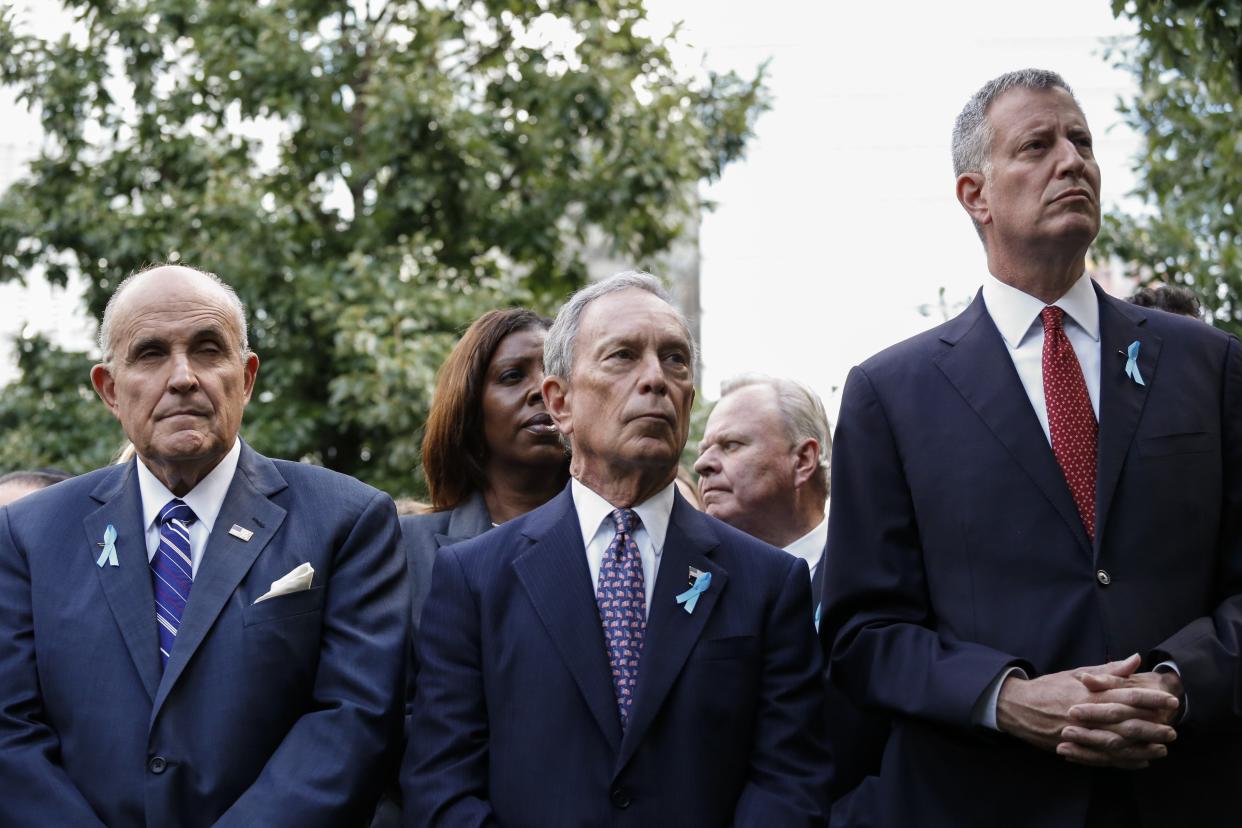 Rudy Giuliani (left) Michael Bloomberg (center) and New York City Mayor Bill de Blasio (right)