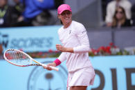 Iga Swiatek of Poland reacts after defeating Madison Keys of USA during the Mutua Madrid Open tennis tournament in Madrid, Spain, Thursday, May 2, 2024. (AP Photo/Manu Fernandez)