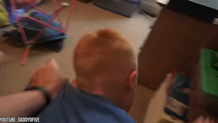 Cody was pushed face first into a bookcase in one video.