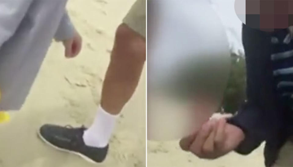 A woman has filmed the moment she was assaulted on a Gold Coast beach by a man in front of her toddler. Here he is approaching the boy and offering him money. Source: 7 News