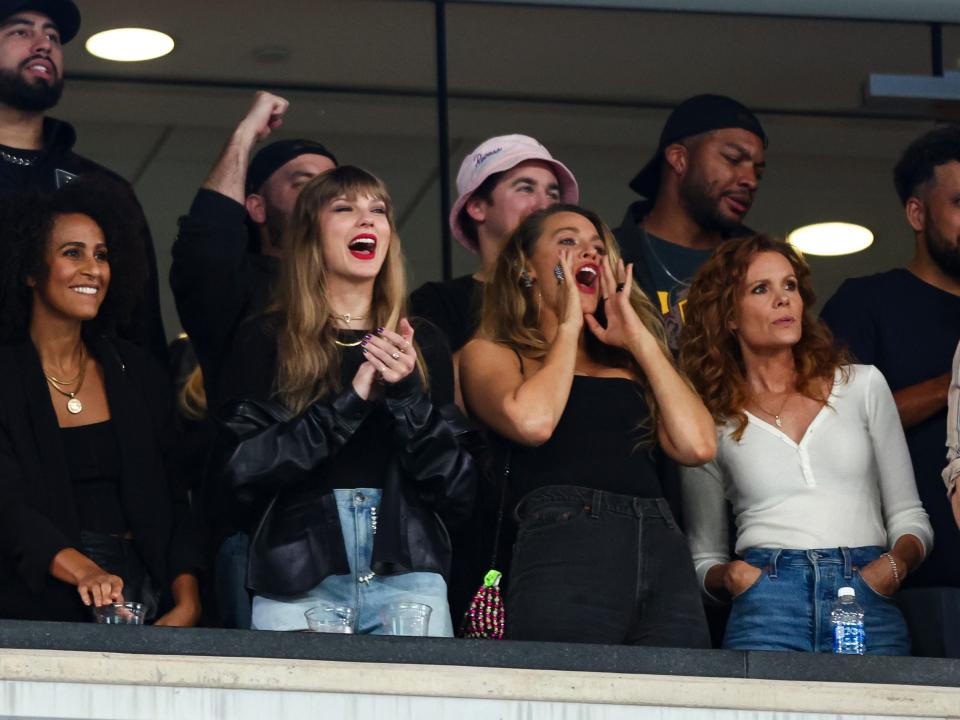 Taylor Swift and Blake Lively cheer from the stands during an NFL football game between the New York Jets and the Kansas City Chiefs at MetLife Stadium