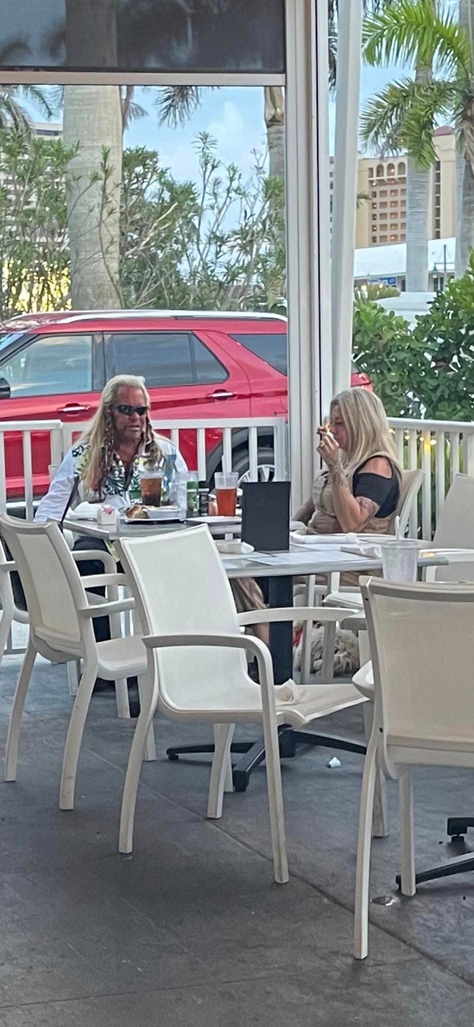 As the weekend winds down, Duane "Dog the Bounty Hunter" Chapman and wife, Francie, enjoy a meal at one of their favorite Marco Island spots, Sami's Pizza and Grill.