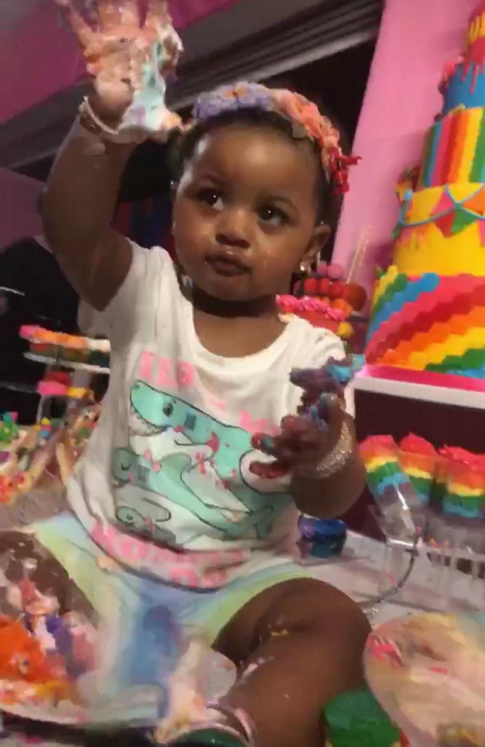 At her <a href="https://people.com/parents/cardi-b-celebrates-daughter-kultures-1st-birthday-party-nyc-blackout/" rel="nofollow noopener" target="_blank" data-ylk="slk:1st birthday party;elm:context_link;itc:0;sec:content-canvas" class="link ">1st birthday party</a>, Kulture accessorized with some cake! 