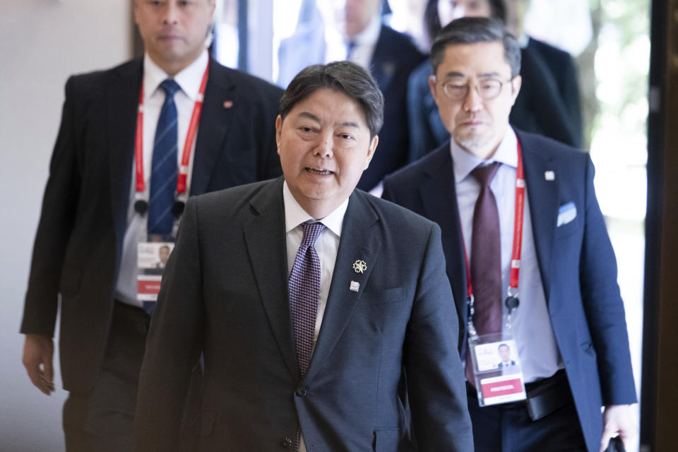 Japan's Foreign Minister Yoshimasa Hayashi, center, arrives at the fifth working session of a G7 Foreign Ministers' Meeting at the Prince Karuizawa hotel in Karuizawa, Japan Tuesday, April 18, 2023. (Yuichi Yamazaki/Pool Photo via AP)