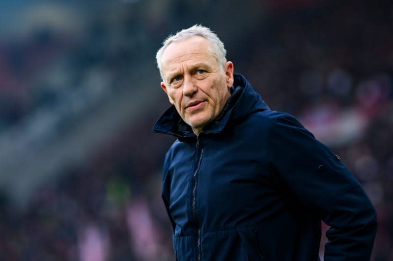 Freiburg coach Christian Streich stands in the stadium before the German Bundesliga soccer match between SC Freiburg and 1. FC Union, at Europa-Park Stadium. Freiburg coach Streich has called on professional football and its fans to take part in the nationwide demonstrations against right-wing extremism. Tom Weller/dpa