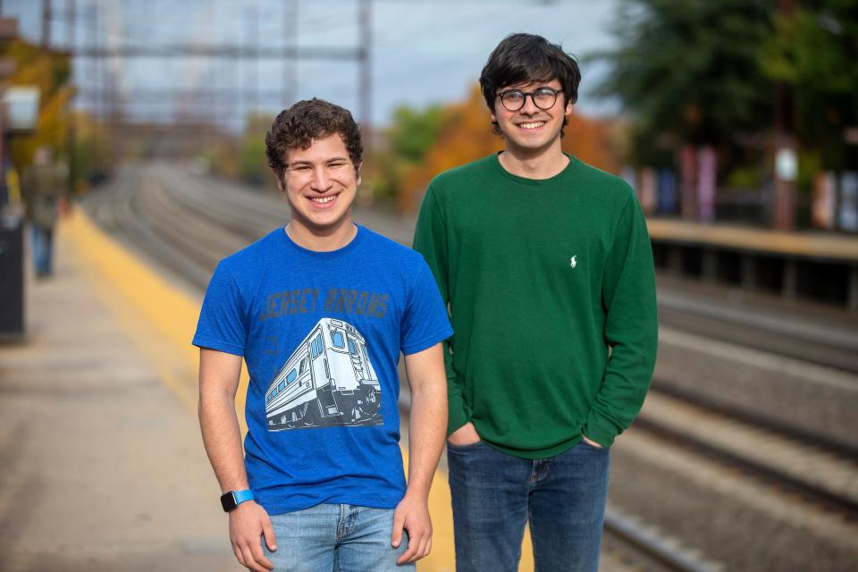 Jeremy Zorek of New York City, a student at Rutgers University, and Miles Taylor of Cambridge, Massachusetts, student at University of Pennsylvania, talk about their recent adventure of traveling from the southernmost end of New Jersey (Cape May) to the northernmost (Warwick, NY) by only using local NJ Transit buses that avoided highways at the New Brunswick Train Station in New Brunswick, NJ Monday, October 31, 2022. 