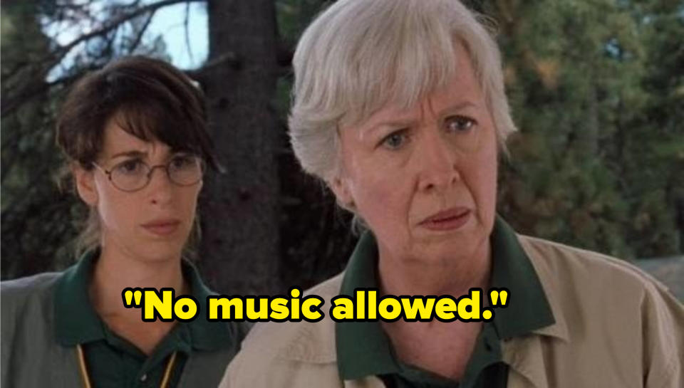 Two camp counselors looking concerned and the words, "No music allowed"