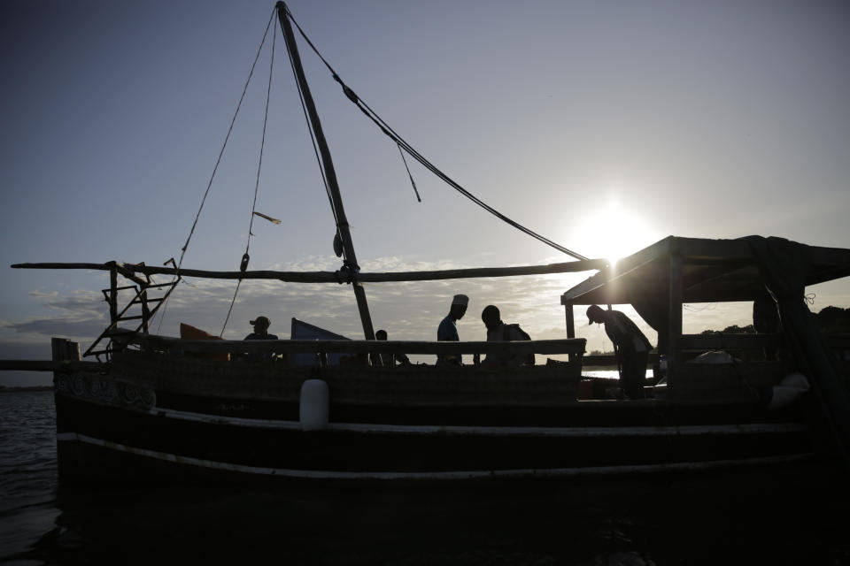 FILE - Fishermen at Shimoni port prepare to head out for their daily catch on June 10, 2022, in Kwale county, Kenya. Indian Ocean countries who want better safeguards for marine life by updating fishing quotas and restricting harmful catch methods are being resisted by the European Union who has interests in the region, conservation groups say. Officials are gathering in Mombasa, Kenya on Friday Feb. 3 for a meeting of the Indian Ocean Tuna Commission — a group of 30 countries that decide regulations and management of tuna in the ocean. (AP Photo/Brian Inganga, File)