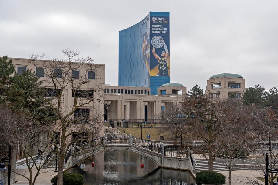 Signs of the upcoming NBA All-Star Game are seen in downtown Indianapolis, Tuesday, Feb. 6, 2024. Giant artwork is seen on the JW Marriott which rises in the horizon over the downtown Canal.