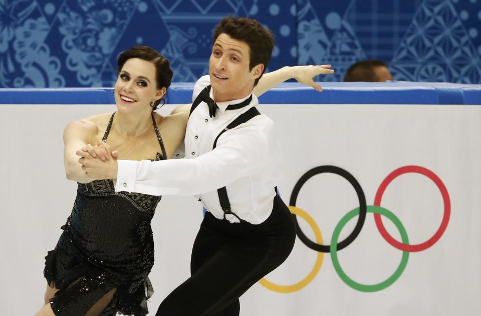 Canada's Tessa Virtue and Scott Moir compete during the Figure Skating Ice Dance Short Dance Program at the Sochi 2014 Winter Olympics