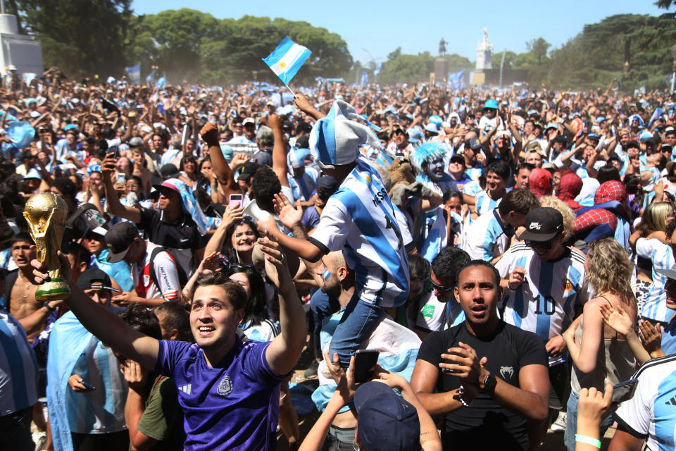 BUENOS AIRES, ARGENTINA - DECEMBER 18: Argentines celebrate the world championship in Qatar 2022 in plazas and parks after defeating France 4-2 in the final on penalties after drawing 3-3, in Buenos Aires, Argentina, on December 18, 2022. (Photo by Mariano Gabriel Sanchez/Anadolu Agency via Getty Images)